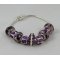 Zilveren armband met paarse parels en strass steentjes
