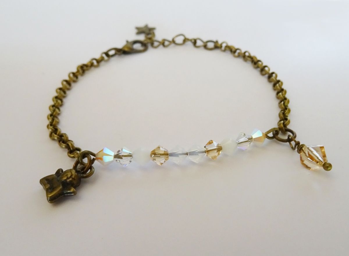 Witte en gouden fijne kettingarmband