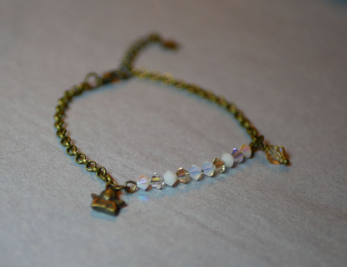 Witte en gouden fijne kettingarmband
