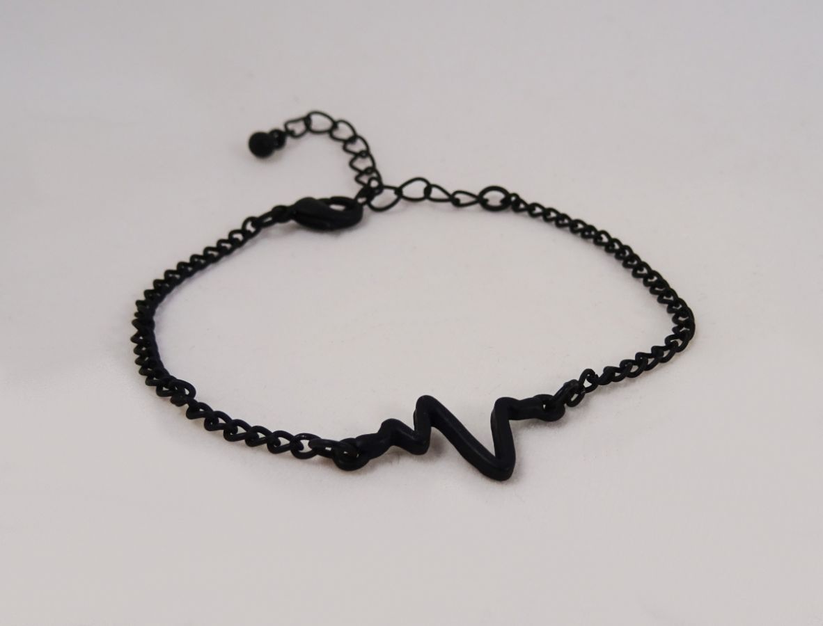 Dunne zwarte armband ontwerp Golven