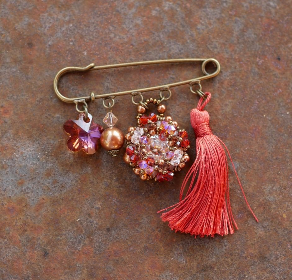 Andros Hyacint Broche met Paprika Pompon