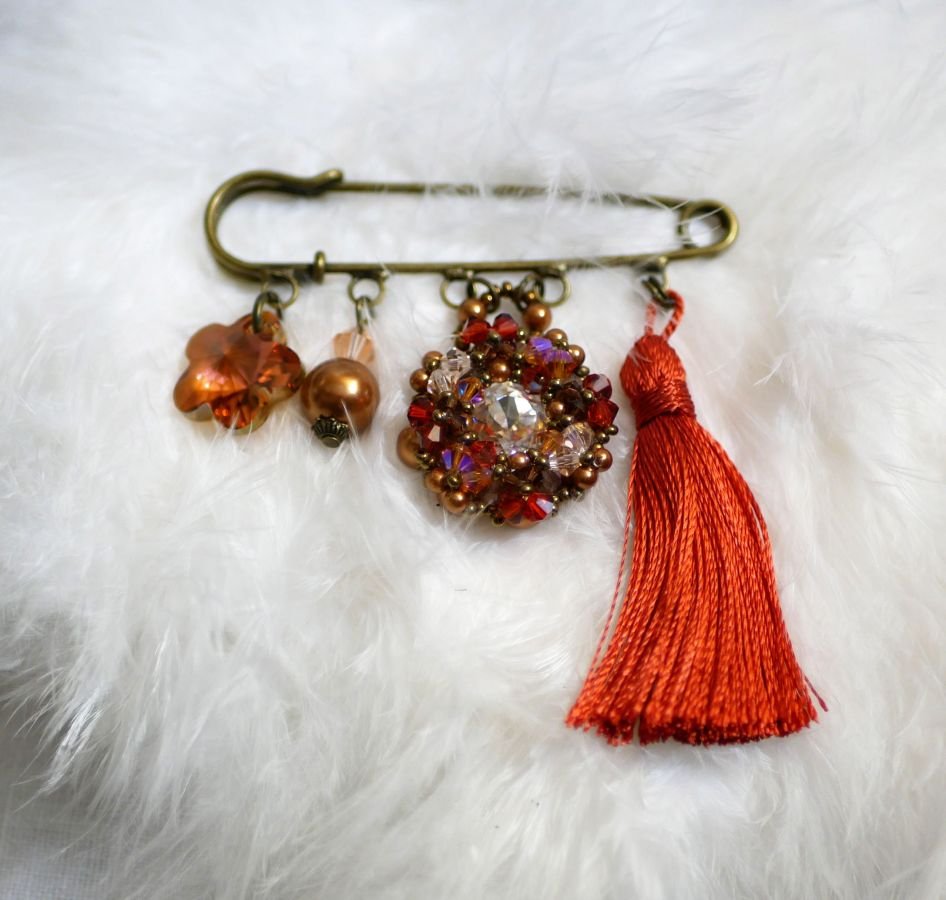 Andros Hyacint Broche met Paprika Pompon