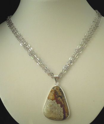 Cabochon hanger gezet in landschap jaspis steen, driehoekige vorm