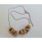 Ketting met zilveren en gouden ringen