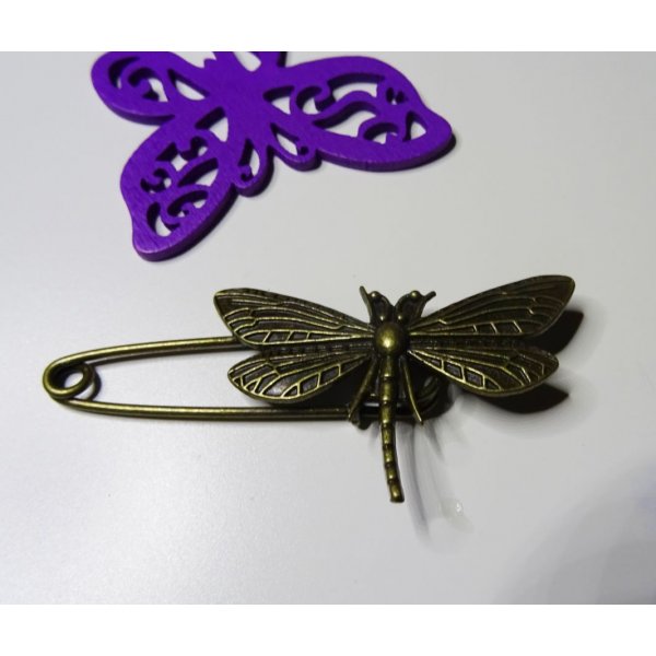 Antieke bronzen libellenspeld