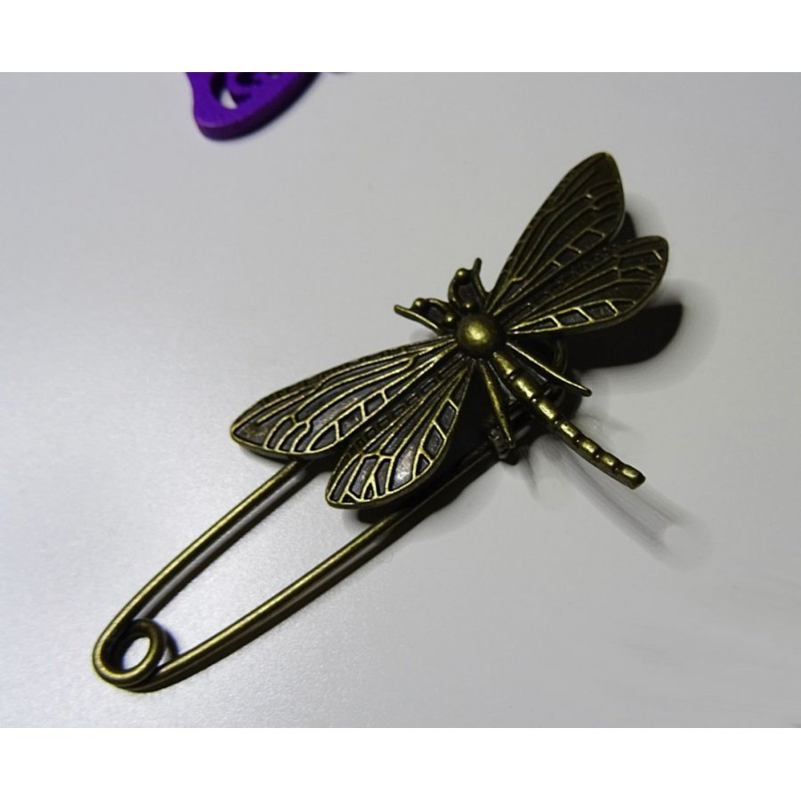 Antieke bronzen libellenspeld