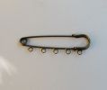Antieke bronzen kilt pin 5 clips