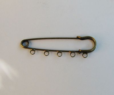 Antieke bronzen kilt pin 5 clips