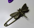 Antieke bronzen libellenspeld