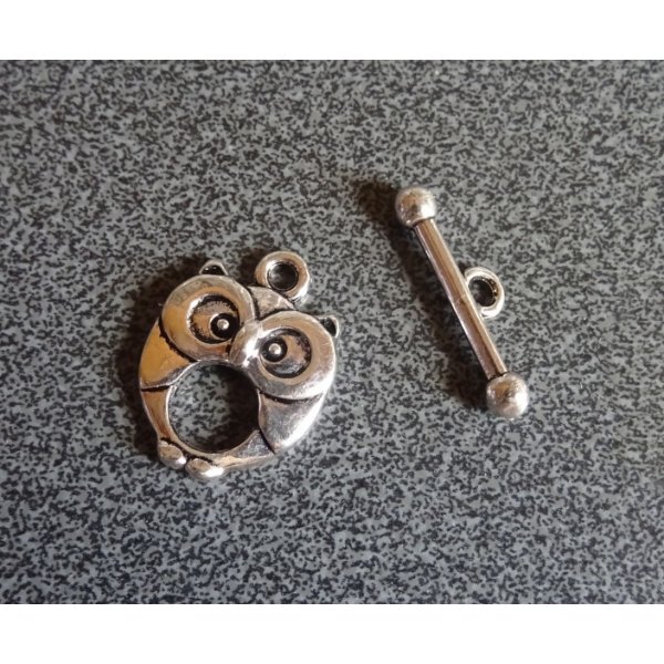 T-sluiting Uil verzilverd