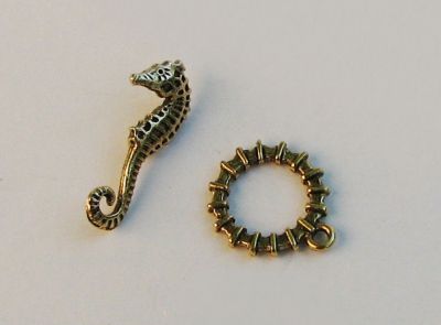 Antiek gouden zeepaardje T-sluiting