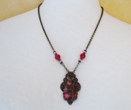 Fuchsia Jaspis hanger op patina print