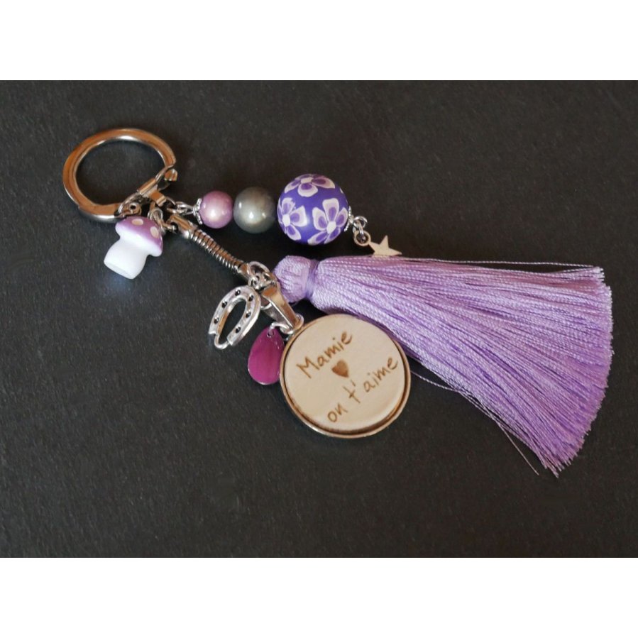 Houten cabochon sleutelhanger met parma kwastje