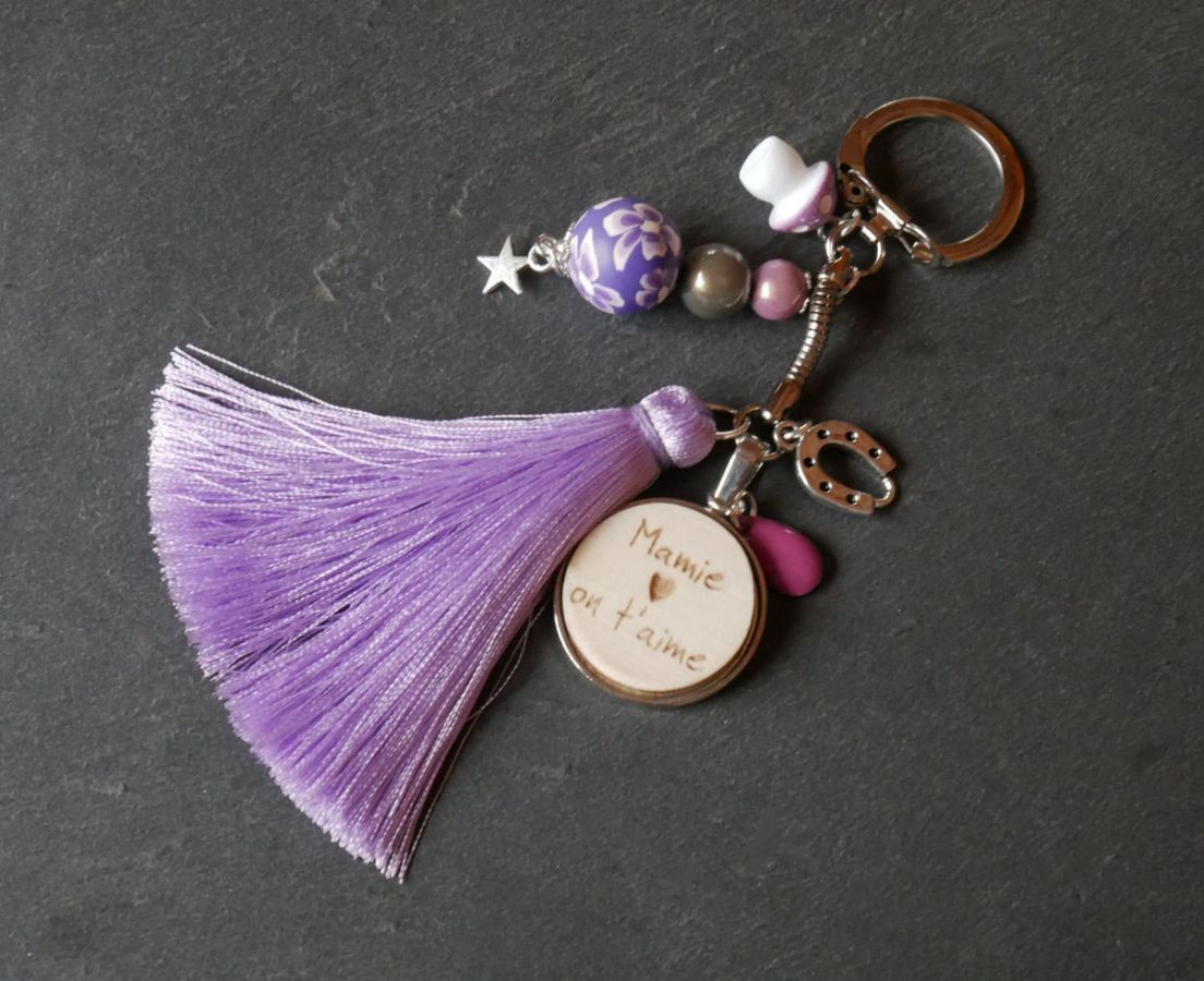 Houten cabochon sleutelhanger met parma kwastje