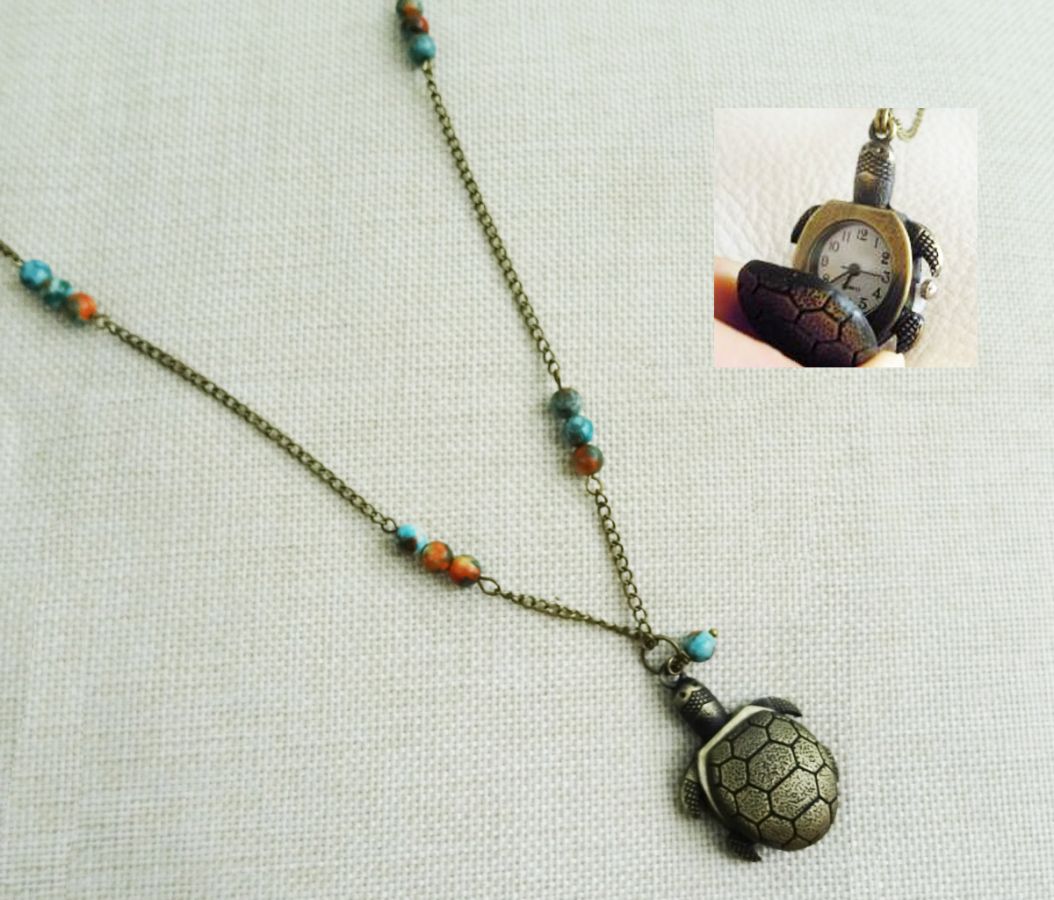 Lange hanger schildpad met parels 