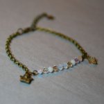 Witte en gouden fijne kettingarmband
