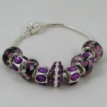 Zilveren armband met paarse parels en strass steentjes