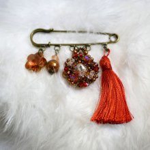 Andros Hyacint Broche met Paprika Pompon