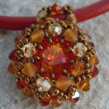 Milos Oranje boom hanger op rood leer