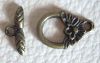 Fermoir en T fleuri laiton 18 mm (+ 1.50 €)